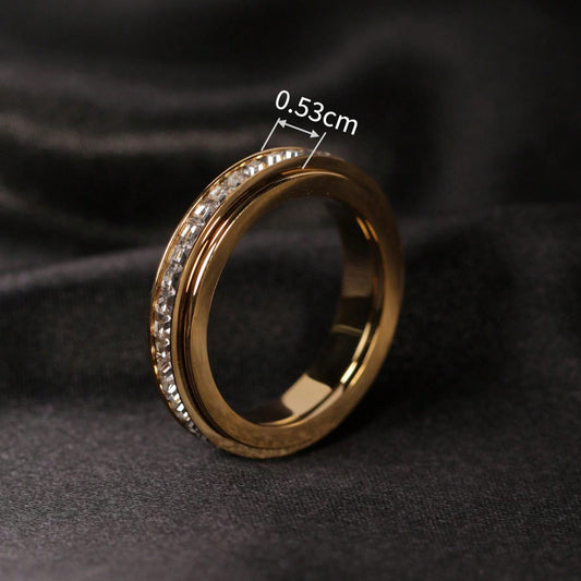 Anillo Europeo y Americano de Estrellas Giratorias de Oro