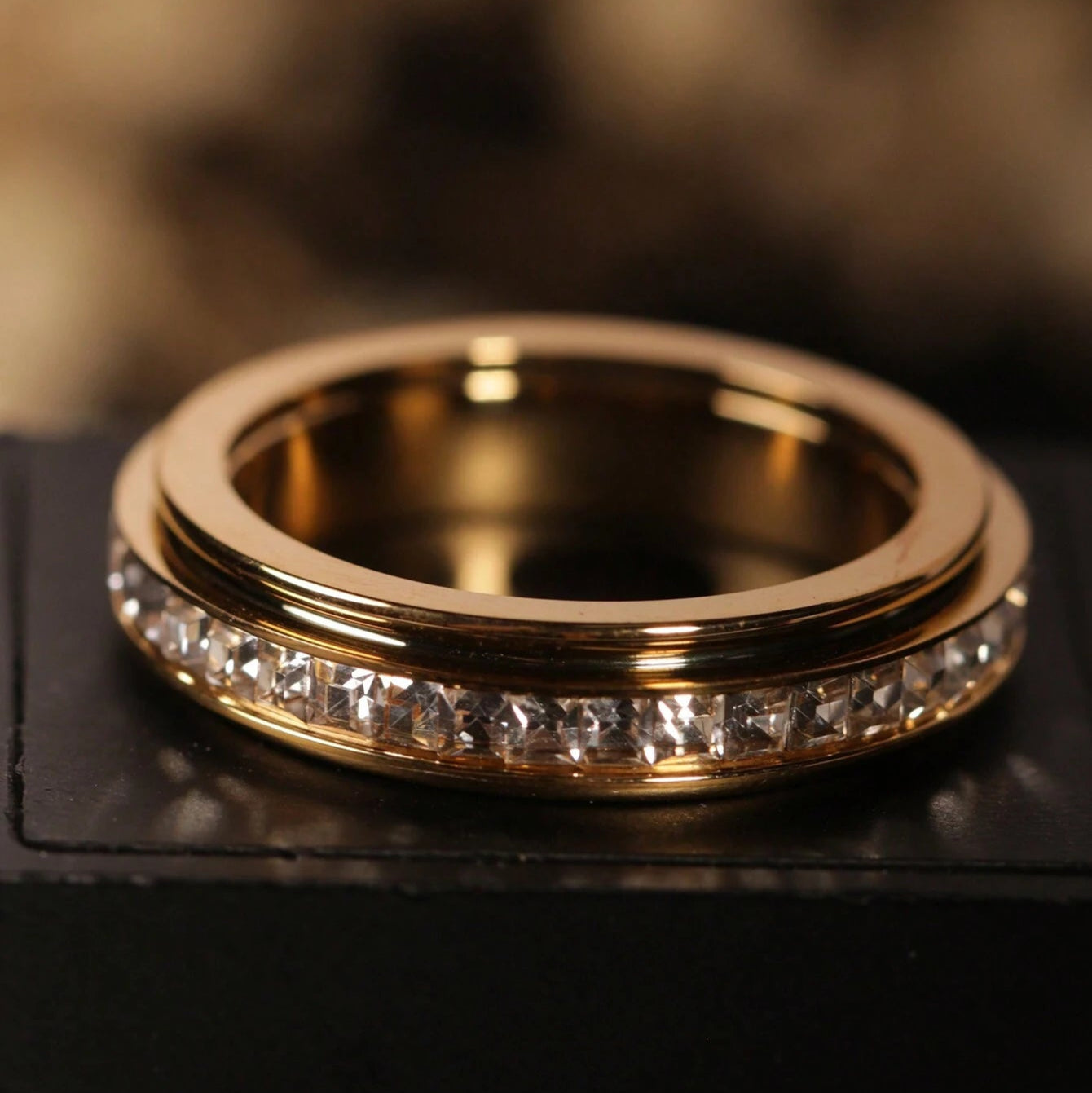 Anillo Europeo y Americano de Estrellas Giratorias de Oro