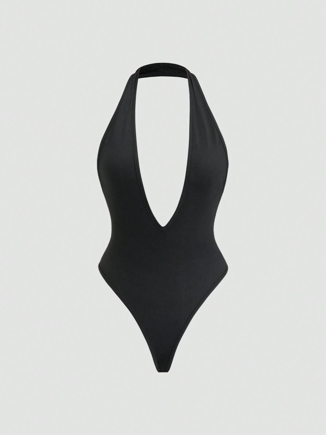 Traje de mujer negro con escote en V y espalda descubierta