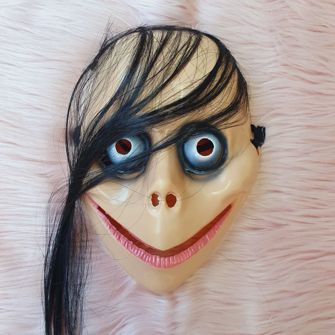 Máscara Momo Temu